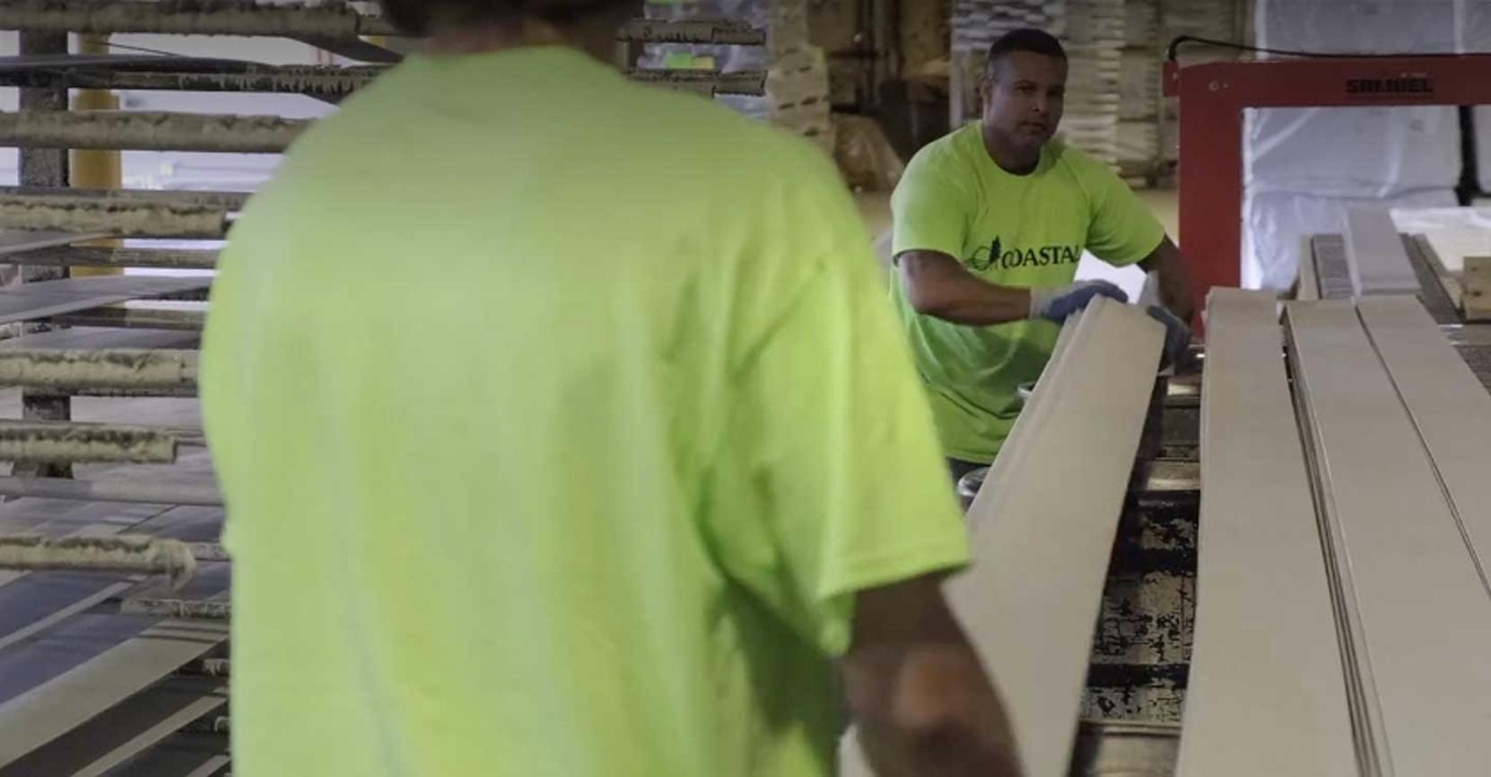 Employees picking an order at Coastal Forest Products, a leading distributer of premium building materials in the Northeast. 